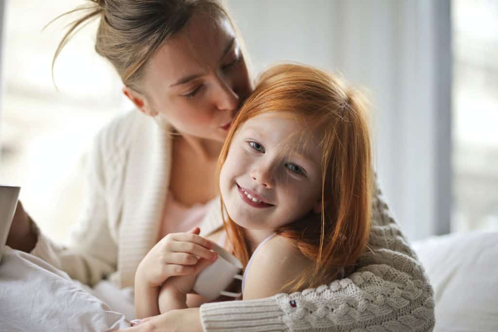 Mother and daughter worshipping online