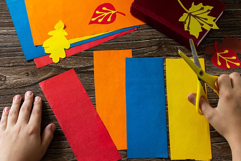 Origami Instruction Step 3. Multicolored Bookmarks Origami Paper Pencil New School Year On A Wooden Table. Welcome To School. Children's Art Project, Needlework, Crafts For Children.